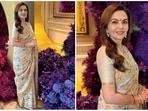 Nita Ambani turned heads in an ivory saree adorned with exquisite floral embroidery. Nita Ambani turned heads in an ivory saree adorned with exquisite floral embroidery.