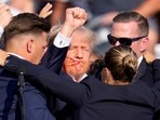 Republican presidential candidate former President Donald Trump is helped off the stage by U.S. Secret Service agents at a campaign event in Butler, Pa., on Saturday, July 13, 2024. (AP Photo/Gene J. Puskar) Republican presidential candidate former President Donald Trump is helped off the stage by U.S. Secret Service agents at a campaign event in Butler, Pa., on Saturday, July 13, 2024. (AP Photo/Gene J. Puskar)