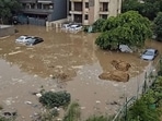 Visuals show luxury cars submerged after rainfall in Gurugram.