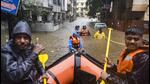 Officials during a rescue operation in a waterlogged area in Pune on Thursday. (PTI) Officials during a rescue operation in a waterlogged area in Pune on Thursday. (PTI)