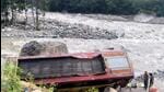 The bus lying on the banks on the Beas river near Manali. (Aqil Khan/HT) The bus lying on the banks on the Beas river near Manali. (Aqil Khan/HT)