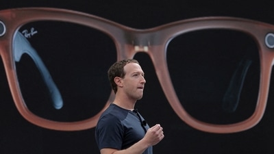 Meta CEO Mark Zuckerberg delivers a speech, as a pair of Ray-Ban smart glasses appear on screen, during the Meta Connect event at the company's headquarters in Menlo Park, California. (Reuters)