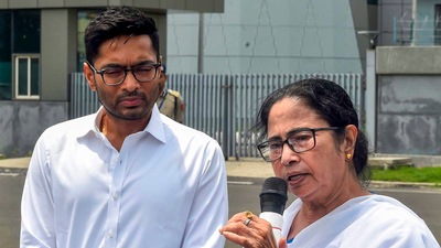 West Bengal CMr and TMC chief Mamata Banerjee with the party’s National General Secretary Abhishek Banerjee at the Netaji Subhash Chandra Bose International Airport before leaving for Delhi, in Kolkata. (PTI)
