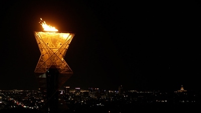 SALT LAKE CITY, UTAH - JULY 24: (EDITOR'S NOTE: Image is an exported frame from a 4K video clip) The Olympic cauldron is lit outside Rice-Eccles Stadium during celebrations of the election of Salt Lake City as the 2034 host of Olympic and Paralympic Winter Games on July 24, 2024 in Salt Lake City, Utah. Korey Martin/Getty Images/AFP (Photo by GETTY IMAGES / GETTY IMAGES NORTH AMERICA / Getty Images via AFP) (Getty Images via AFP) SALT LAKE CITY, UTAH - JULY 24: (EDITOR'S NOTE: Image is an exported frame from a 4K video clip) The Olympic cauldron is lit outside Rice-Eccles Stadium during celebrations of the election of Salt Lake City as the 2034 host of Olympic and Paralympic Winter Games on July 24, 2024 in Salt Lake City, Utah. Korey Martin/Getty Images/AFP (Photo by GETTY IMAGES / GETTY IMAGES NORTH AMERICA / Getty Images via AFP) (Getty Images via AFP)