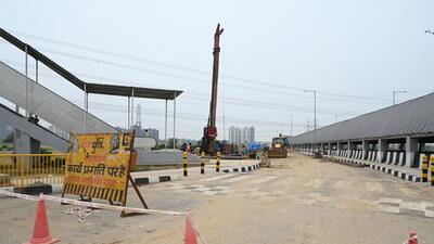 Ongoing construction work of the flyover connecting Dwarka Expressway to Pataudi Road going on near sector-88A in Gurugram on Friday. (Parveen Kumar/HT) Ongoing construction work of the flyover connecting Dwarka Expressway to Pataudi Road going on near sector-88A in Gurugram on Friday. (Parveen Kumar/HT)