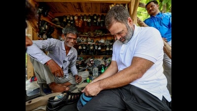 Rahul Gandhi tries his hands at shoe repairing during a short conversation with Ram Chait, a cobbler in Kurebhar near Sultanpur. He met Chait while on his way back to Lucknow from Sultanpur on Friday (ANI) Rahul Gandhi tries his hands at shoe repairing during a short conversation with Ram Chait, a cobbler in Kurebhar near Sultanpur. He met Chait while on his way back to Lucknow from Sultanpur on Friday (ANI)