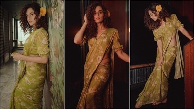 Taapsee Pannu is embracing her saree era, and her Instagram diaries are proof. Recently, she dazzled in a six-yard saree by Tribe Amrapali, featuring a striking floral print against a pastel green backdrop. Paired with a matching sweetheart neckline blouse, she looked absolutely stunning. (Instagram) Taapsee Pannu is embracing her saree era, and her Instagram diaries are proof. Recently, she dazzled in a six-yard saree by Tribe Amrapali, featuring a striking floral print against a pastel green backdrop. Paired with a matching sweetheart neckline blouse, she looked absolutely stunning. (Instagram)