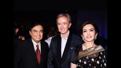 Mukesh Ambani (left), Nita Ambani (right) with LVHM billionaire Bernard Arnault (centre) at Paris Olympics 2024. (Instagram/@ambani_update) Mukesh Ambani (left), Nita Ambani (right) with LVHM billionaire Bernard Arnault (centre) at Paris Olympics 2024. (Instagram/@ambani_update)