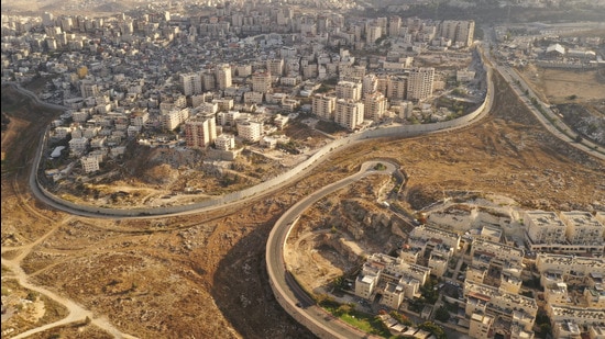 Aerial view of Israel and Palestine divided by a security wall. (Shutterstock) Aerial view of Israel and Palestine divided by a security wall. (Shutterstock)