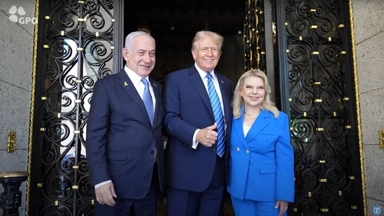 This still image taken from an Israeli Government Press Office video shows Israeli Prime Minister Benjamin Netanyahu (L) and his wife Sara (R) being welcomed by former US President Donald Trump at the Mar-a-Lago Club in Palm Beach, Florida, on July 26, 2024.(AFP)
