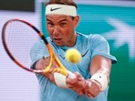 Rafael Nadal plays a shot. Rafael Nadal plays a shot.
