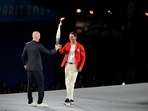 Zinedine Zidane hands the torch over to Rafael Nadal.(AP) Zinedine Zidane hands the torch over to Rafael Nadal.(AP)