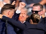 Republican presidential candidate former President Donald Trump is helped off the stage by U.S. Secret Service agents at a campaign event in Butler, Pa., on Saturday, July 13, 2024. (AP Photo/Gene J. Puskar)(AP) Republican presidential candidate former President Donald Trump is helped off the stage by U.S. Secret Service agents at a campaign event in Butler, Pa., on Saturday, July 13, 2024. (AP Photo/Gene J. Puskar)(AP)