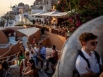Greece dream island destination to crowded chaos: Santorini bursts with tourists as locals call for a cap (Photo by REUTERS/Alkis Konstantinidis )