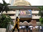 A pedestrian walks past the Bombay Stock Exchange (BSE) building during the presentation of budget, in Mumbai, India, on Tuesday, July 23, 2024. (Photo by Anshuman Poyrekar/ Hindustan Times) A pedestrian walks past the Bombay Stock Exchange (BSE) building during the presentation of budget, in Mumbai, India, on Tuesday, July 23, 2024. (Photo by Anshuman Poyrekar/ Hindustan Times)
