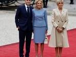 First lady Jill Biden welcomed by French President Emmanuel Macron and his wife Brigitte Macron at the Elysee Palace ahead of an opening ceremony.