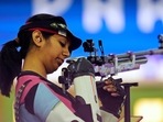 India's Ramita Jindal looks at her rifle as he competes in the 10m air rifle mixed team qualification round at the 2024 Summer Olympics, Saturday, July 27, 2024, in Chateauroux, France. (AP Photo/Manish Swarup)