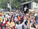 People crowd near an NCCF mobile van outside Krishi Bhavan in Delhi on Tuesday to purchase tomatoes at a subsidised rate. (Sanjeev Verma/ HT Photo/ File) People crowd near an NCCF mobile van outside Krishi Bhavan in Delhi on Tuesday to purchase tomatoes at a subsidised rate. (Sanjeev Verma/ HT Photo/ File)