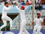 Afghanistan captain Rashid Khan celebrates during a Test against Bangladesh