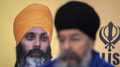 A photo of Hardeep Singh Nijjar is seen during a news conference providing an update from the Sikh community about Nijjar's homicide from June 18, 2023 in Canada’s Surrey, British Columbia. (AP)
