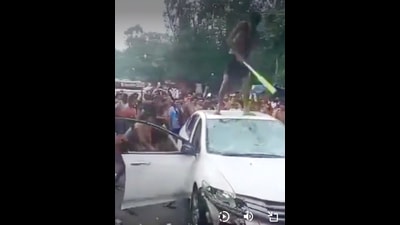 A video of the incident also went viral over the social media. It shows many of the kanwariyas atop the car and damaging it with sticks, rods and baseball bats while hundreds of others look on. (HT Photo) A video of the incident also went viral over the social media. It shows many of the kanwariyas atop the car and damaging it with sticks, rods and baseball bats while hundreds of others look on. (HT Photo)