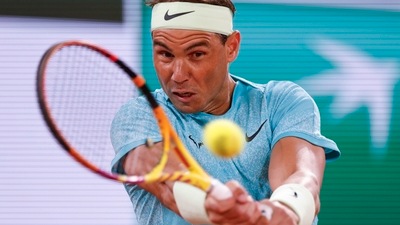 Rafael Nadal plays a shot. (AP) Rafael Nadal plays a shot. (AP)