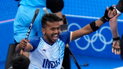 Vivek Sagar Prasad helped India take advantage in the third quarter with a close-range shot as New Zealand crumbled under pressure. (AP) Vivek Sagar Prasad helped India take advantage in the third quarter with a close-range shot as New Zealand crumbled under pressure. (AP)
