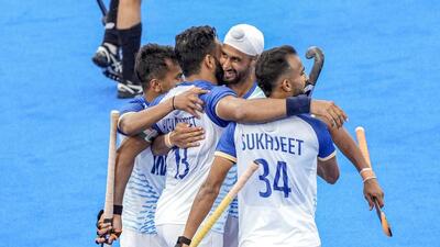 India's Harmanpreet Singh with teammates celebrates after scoring a goal from a penalty stroke against New Zealand during the Pool B hockey match between India and New Zealand, in Paris, Saturday. (PTI) India's Harmanpreet Singh with teammates celebrates after scoring a goal from a penalty stroke against New Zealand during the Pool B hockey match between India and New Zealand, in Paris, Saturday. (PTI)