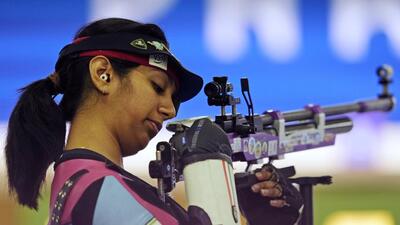 India's Ramita Jindal during the 10m air rifle mixed team qualification round on Saturday. (AP) India's Ramita Jindal during the 10m air rifle mixed team qualification round on Saturday. (AP)