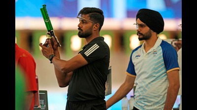 India's Sarabjot Singh ( right) narrowly missed out on a final spot in 10m air pistol qualification at the Paris Olympics on Saturday. (AP) India's Sarabjot Singh ( right) narrowly missed out on a final spot in 10m air pistol qualification at the Paris Olympics on Saturday. (AP)