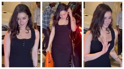 Shraddha Kapoor opted for a simple black dress with a square neckline. The buttons near the neckline added a dainty touch to her black bodycon dress. But not all was in monochrome, her orange bag and golden earrings added playful contrast to her ensemble. (Instagram/@varindertchawla) Shraddha Kapoor opted for a simple black dress with a square neckline. The buttons near the neckline added a dainty touch to her black bodycon dress. But not all was in monochrome, her orange bag and golden earrings added playful contrast to her ensemble. (Instagram/@varindertchawla)