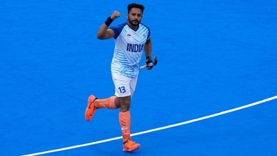 India's captain Harmanpreet Singh scored a late goal via penalty stroke to help his team register a crucial win in their opening match of the tournament. (AP) India's captain Harmanpreet Singh scored a late goal via penalty stroke to help his team register a crucial win in their opening match of the tournament. (AP)