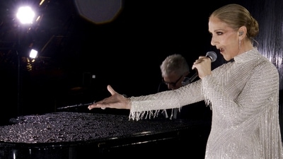 Singer Celine Dion performed at the Eiffel Tower during the opening ceremony for the 2024 Summer Olympics in Paris, France, on Friday, July 26, 2024. (Olympic Broadcasting Services via AP) (AP) Singer Celine Dion performed at the Eiffel Tower during the opening ceremony for the 2024 Summer Olympics in Paris, France, on Friday, July 26, 2024. (Olympic Broadcasting Services via AP) (AP)