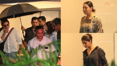 Shah Rukh Khan, Gauri Khan, and Suhana Khan outside Farah Khan's house. Shah Rukh Khan, Gauri Khan, and Suhana Khan outside Farah Khan's house.