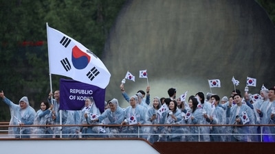 Olympics 2024: Athletes of South Korea aboard a boat in the floating parade on the river Seine during the opening ceremony. (Reuters)