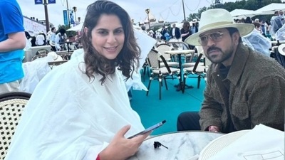 Ram Charan and Upasana were drenched in rain while attending the Paris Olympics 2024 ceremony. Upasana took to her Instagram handle and captioned it as, #drenched, #parisolympics2024. The Game Changer actor's parents Chiranjeevi and Surekha also accompanied the couple for the event. Ram and Upasana's daughter Klin Kaara and their pet dog - Rhyme also joined them in Paris. 