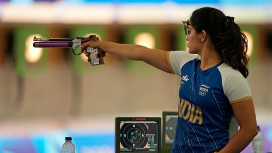 India's Manu Bhaker takes aim during the 10m Air Pistol Women Pre-event Training at the 2024 Summer Olympics, Friday, July 26, 2024(AP)