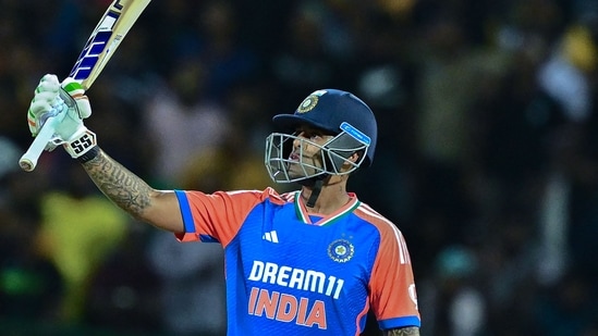 India's captain Suryakumar Yadav celebrates after scoring a half-century (50 runs) during the first Twenty20 international cricket match between Sri Lanka and India(AFP)