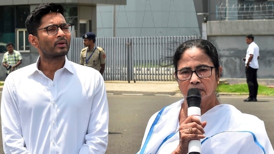 West Bengal Chief Minister and TMC chief Mamata Banerjee with the party's National General Secretary Abhishek Banerjee addresses the media at the Netaji Subhash Chandra Bose International Airport before leaving for Delhi, in Kolkata, Friday, July 26, 2024. (PTI Photo) 