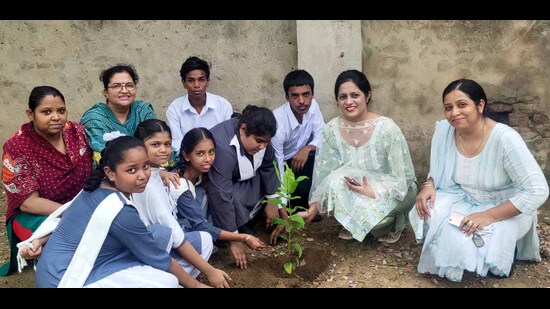 Plantation drive organized by the government schools during the education week celebrations in Ludhiana. (HT Photo)