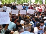 Students in a furious manner stage a protest outside the 'Rau IAS Study Centre' after three civil service aspirants died due to flooding in the basement of the coaching centre, at Old Rajinder Nagar in New Delhi on Sunday.