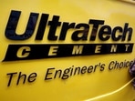 A man cleans an Expert Testing Van of UltraTech Cement outside a cement store in Ahmedabad. (Amit Dave/Reuters)