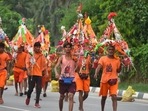 Traffic was resumed only after police personnel pacified the Kanwariyas and provided them holy Ganga water kept in reserve at a police station, reported PTI. (HT Photo) Traffic was resumed only after police personnel pacified the Kanwariyas and provided them holy Ganga water kept in reserve at a police station, reported PTI. (HT Photo)
