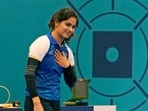 India's Manu Bhaker celebrates after winning the bronze medal in the 10m air pistol women's final round at the 2024 Summer Olympics