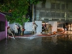Officials from Fire Department pumps out the water from Rau' IAS study circle in old Rajendra Nagar where few students were allegedly drowned to death after the basement of the building was flooded following heavy rain in New Delhi, Officials from Fire Department pumps out the water from Rau' IAS study circle in old Rajendra Nagar where few students were allegedly drowned to death after the basement of the building was flooded following heavy rain in New Delhi,