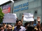 Student UPSC aspirants protest out side Rau's Study Circle against the incident of last night flooding which claims three students lives at Old Rajinder Nagar (Photo by Vipin Kumar/ Hindustan Times) Student UPSC aspirants protest out side Rau's Study Circle against the incident of last night flooding which claims three students lives at Old Rajinder Nagar (Photo by Vipin Kumar/ Hindustan Times)