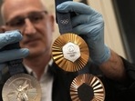 The Paris 2024 Olympics are offering athletes something truly unique: medals that feature authentic pieces of the iconic Eiffel Tower. (AP photo) The Paris 2024 Olympics are offering athletes something truly unique: medals that feature authentic pieces of the iconic Eiffel Tower. (AP photo)