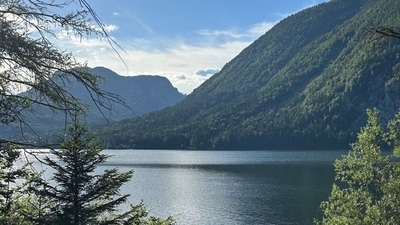Katrina Kaif dropped breathtaking photos from her vacation. She gave a glimpse of the mountains near a lake. 