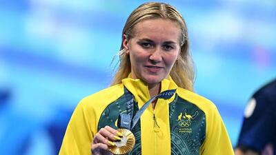 Australia's Ariarne Titmus reacts with her medal following the the women's 400m freestyle swimming event at the Paris 2024 Olympic Games, on Saturday. (AFP) Australia's Ariarne Titmus reacts with her medal following the the women's 400m freestyle swimming event at the Paris 2024 Olympic Games, on Saturday. (AFP)