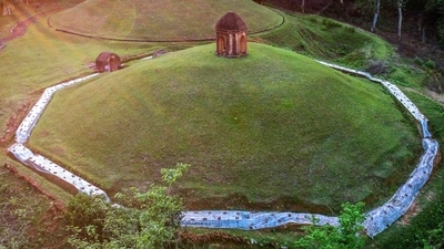 The Charaideo Moidams, a unique 700-year-old burial mounds of the Ahom Dynasty from Assam has been officially inscribed on the United Nations Educational, Scientific and Cultural Organization (UNESCO) World Heritage List on July 26 becoming the 43rd property from India to be included in the prestigious index, on Friday. (ANI Photo) The Charaideo Moidams, a unique 700-year-old burial mounds of the Ahom Dynasty from Assam has been officially inscribed on the United Nations Educational, Scientific and Cultural Organization (UNESCO) World Heritage List on July 26 becoming the 43rd property from India to be included in the prestigious index, on Friday. (ANI Photo)